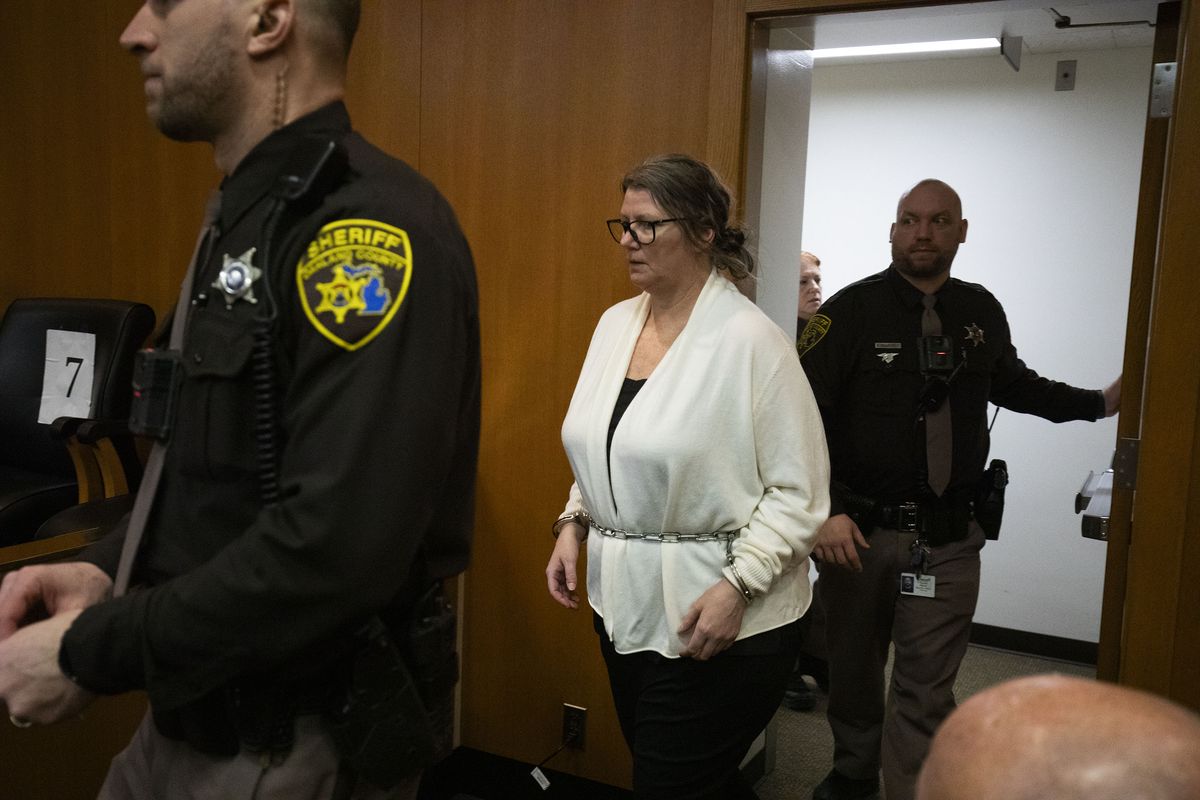 Jennifer Crumbley, the mother of Oxford school shooter Ethan Crumbley, enters a court room at Oakland County Circuit Court before jury deliberations begin in her trial on four counts of involuntary manslaughter on Feb. 5, 2024, in Pontiac, Michigan. This is the first time in U.S. history that a parent has been charged with and tried for involuntary manslaughter for a mass school shooting committed by their child. Her husband, James Crumbley, goes on trial in March for the same charges.    (Bill Pugliano/Getty Images North America/TNS)